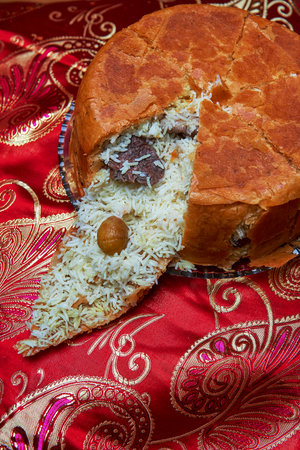 National Azerbaijani cuisine rice in lavash and dried meat stuffing called Shah pilaf