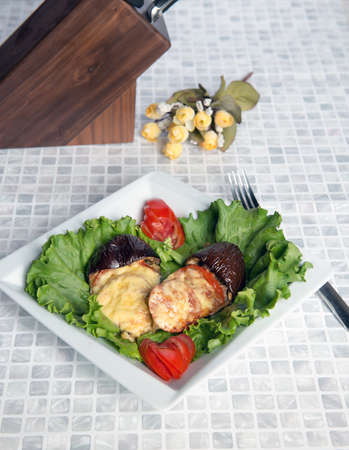 Fried stuffed eggplant with meat and tomatoesの写真素材