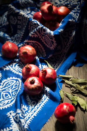 Azerbaijani national national silk scarf called Kelagayi still life with pomegranates studio shootingの写真素材