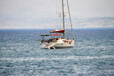 View of the wild places Italy Sicily beautiful views clear clear water sea yachts vacationの写真素材