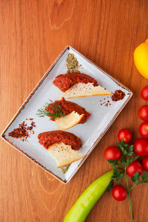 tomato paste with spices and special ingredients with chopped thin garlic breadcrumbs from the chefの写真素材