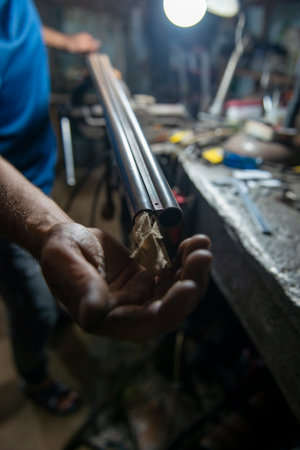 gunsmith's gun barrel grinding polishingの写真素材