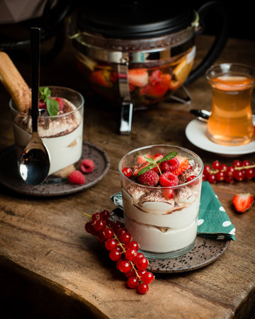 Creamy fruit cocktail with whole fruit still lifeの写真素材
