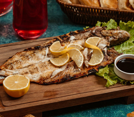 Fish cooked on charcoal Fish from the Caspian Sea called Kutumの写真素材
