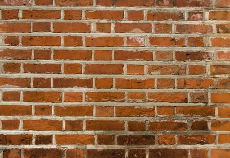 Old wall of the lock. A brick wall.
