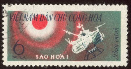The scanned stamp. The space satellite. The Vietnamese stamp.の写真素材
