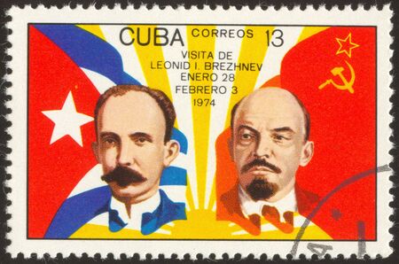 The scanned stamp. The Cuban stamp. Two men against flags.のeditorial素材
