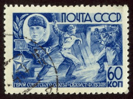 The scanned stamp. The Soviet stamp. Soldiers are at war with the enemy.のeditorial素材