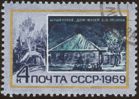 The scanned stamp. The Soviet stamp. The house in the village.の写真素材
