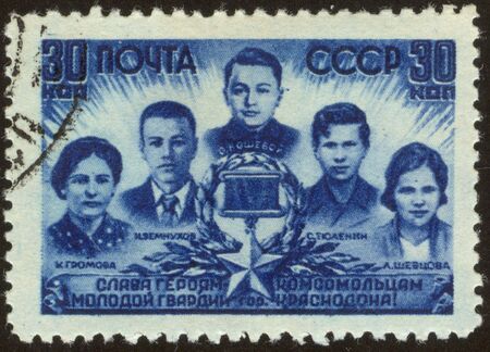 The scanned stamp. The Soviet stamp. Heroes Members of the Komsomol.のeditorial素材