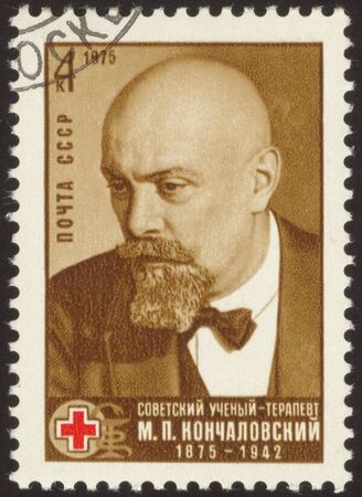 The scanned stamp. The Soviet stamp. The elderly man.のeditorial素材