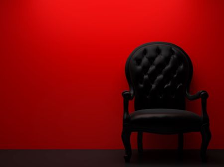High resolution image interior. Armchair near a wall in a red room.の写真素材