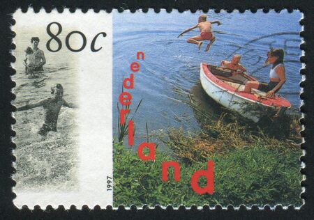 NETHERLANDS - CIRCA 1997: Water Recreation. Boat near coast, circa 1997.の写真素材