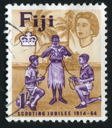 FIJI - CIRCA 1964: Scouts of India FIJI  and Europe Tying Knot, circa 1964.のeditorial素材