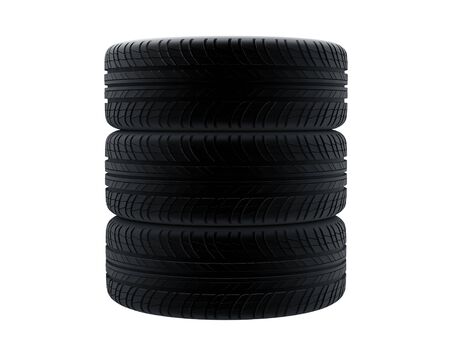 New tires stacked up and isolated on white background.の写真素材
