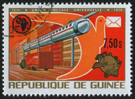 GUINEA - CIRCA 1974:   stamp printed by Guinea,  shows street in a city, circa 1974.の写真素材