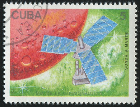 stamp printed by Cuba,  shows satellite and planet, circa 1988.の写真素材