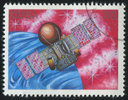 stamp printed by Cuba,  shows satellite and planet, circa 1988.