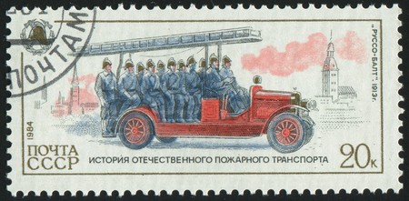 stamp printed by Russia, shows retro firetruck, circa 1984.