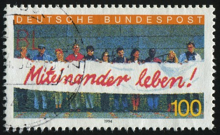 GERMANY- CIRCA 1994: stamp printed by Germany, shows Foreigners in Germany Living Together, circa...