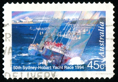 AUSTRALIA - CIRCA 1994: stamp printed by Australia, shows Sydney-Hobart Yacht Race, circa 1994の写真素材