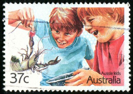 AUSTRALIA - CIRCA 1987: stamp printed by Australia, shows two boys, circa 1987のeditorial素材