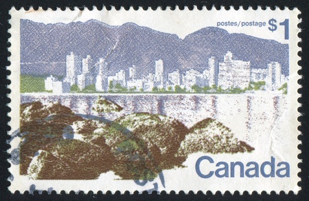 CANADA - CIRCA 1973: stamp printed by Canada, shows Vancouver, circa 1973の写真素材