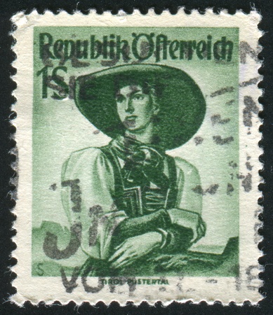 AUSTRIA - CIRCA 1948: stamp printed by Austria, shows Austrian Costumes, Tyrol, Puster Valley, circa 1948のeditorial素材