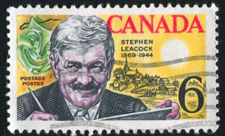 CANADA - CIRCA 1969: stamp printed by Canada, shows Stephen Leacock, Comedy Mask and Mariposa View, circa 1969のeditorial素材
