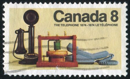 CANADA - CIRCA 1974: stamp printed by Canada, shows Telephones, circa 1974の写真素材