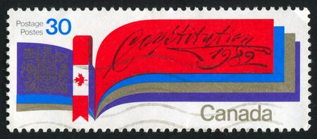 CANADA - CIRCA 1982: stamp printed by Canada, shows Canada flag, circa 1982の写真素材