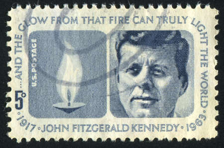 UNITED STATES - CIRCA 1963: stamp printed by United states, shows John F. Kennedy and Eternal Flame, circa 1963のeditorial素材