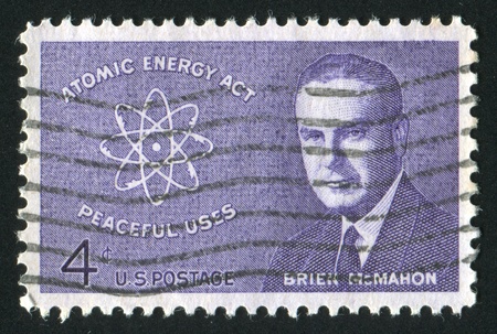 UNITED STATES - CIRCA 1962: stamp printed by United states, shows Senator Brien McMahon and Atomic Diagram, circa 1962のeditorial素材