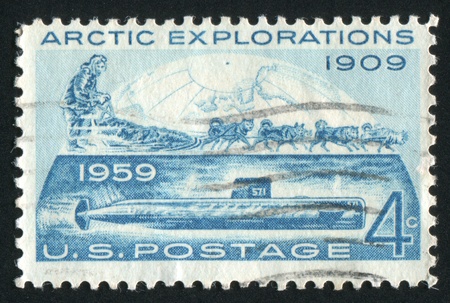 UNITED STATES - CIRCA 1959: stamp printed by United states, shows North Pole Dog Sled and Nautilus, circa 1959の写真素材