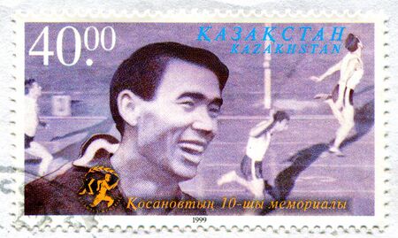 KAZAKHSTAN - CIRCA 1999: stamp printed by Kazakstan, shows Gusman Kosanov Memorial Track, circa 1999.のeditorial素材
