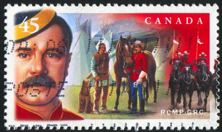 CANADA - CIRCA 1998: stamp printed by Canada, shows Royal Canadian Mounted Police, circa 1998のeditorial素材