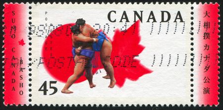 CANADA - CIRCA 1998: stamp printed by Canada, shows Sumo, circa 1998のeditorial素材
