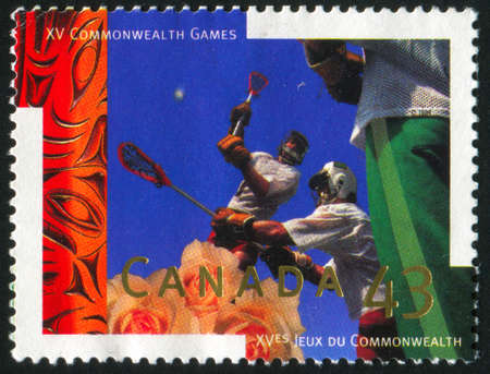 CANADA - CIRCA 1994: stamp printed by Canada, shows Lacrosse, circa 1994のeditorial素材