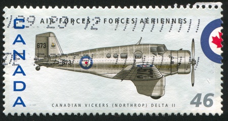 CANADA - CIRCA 1999: stamp printed by Canada, shows aeroplane, Canadian Vickers (Northrop) Delta II, circa 1999の写真素材