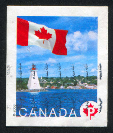 CANADA - CIRCA 2006: stamp printed by Canada, shows Flag and Lake, Nova Scotia, circa 2006の写真素材