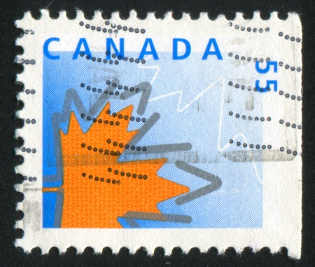 CANADA - CIRCA 1992: stamp printed by Canada, shows Maple Leaf, circa 1992の写真素材