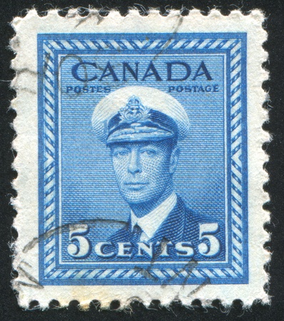 CANADA - CIRCA 1942: stamp printed by Canada, shows King George VI, circa 1942のeditorial素材