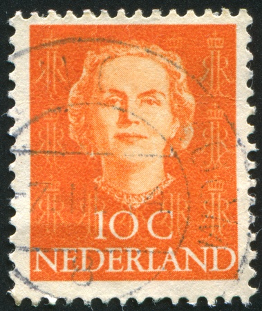 NETHERLANDS - CIRCA 1949: stamp printed by Netherlands, shows Queen Juliana, circa 1949のeditorial素材