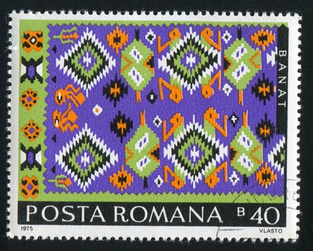 ROMANIA - CIRCA 1975: stamp printed by Romania, show Romanian Peasant Rugs, circa 1975.