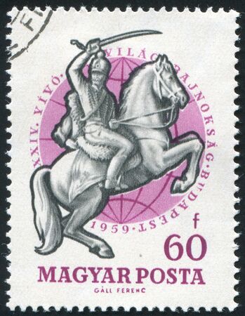 HUNGARY - CIRCA 1959: stamp printed by Hungary, shows Cavalry man, circa 1959の写真素材