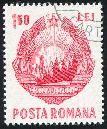 ROMANIA - CIRCA 1953: stamp printed by Romania, show Romania arms, circa 1953.の写真素材