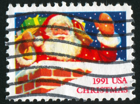 UNITED STATES - CIRCA 1991: stamp printed by United states, shows Santa Claus, circa 1991の写真素材