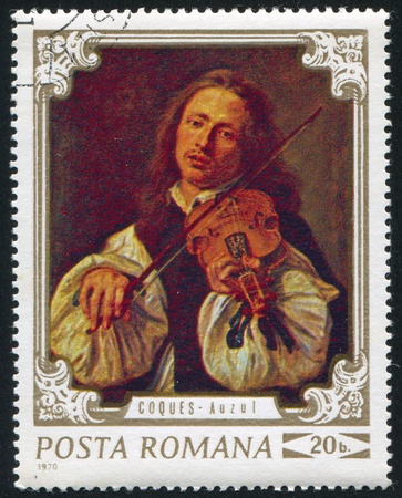ROMANIA - CIRCA 1970: stamp printed by Romania, shows a portrait of a man playing on violin by Gonzales Coques (1618 - 1684), circa 1970のeditorial素材