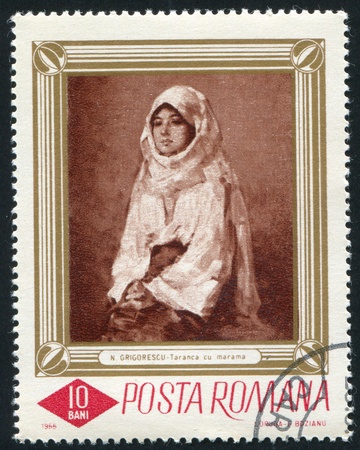 ROMANIA - CIRCA 1966: stamp printed by Romania, shows Peasant Woman, by Nicolae Grigorescu, circa 1966のeditorial素材