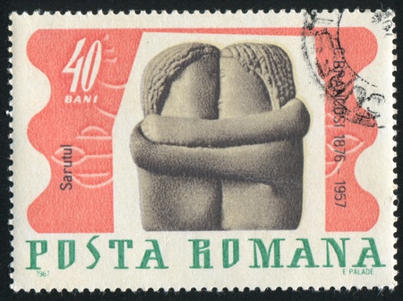 ROMANIA - CIRCA 1967: stamp printed by Romania, shows The Kiss, by Brancusi, circa 1967の写真素材